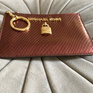 NWOT Michael Kors key chain wallet.  Gorgeous Iridescent Burgundy!